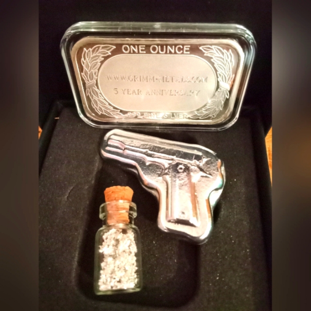 “Rare Bullion Trio – Silver Bar, Zinc Pistol, & Crystallized Silver Mini Vial”